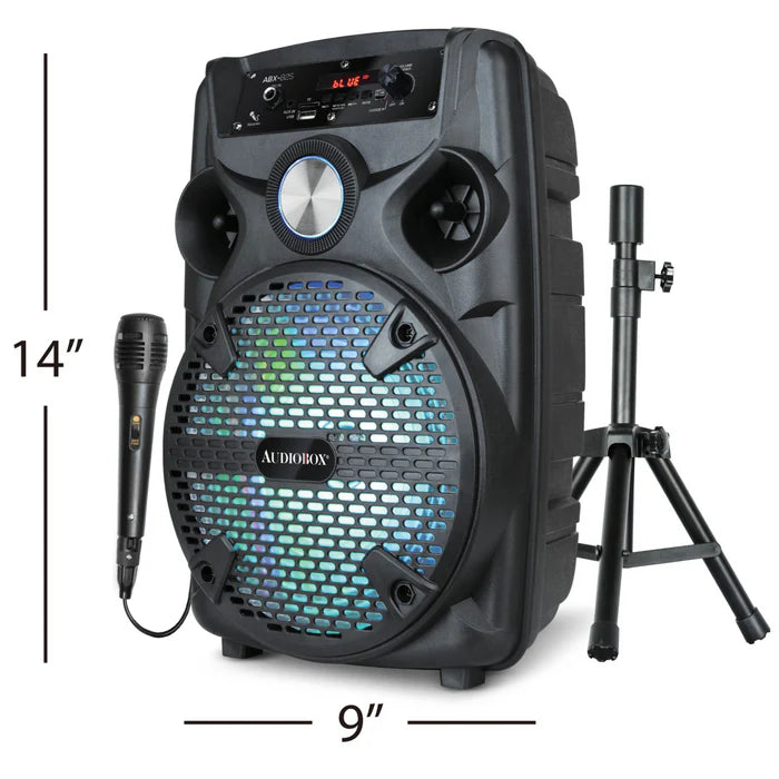 Portable speaker with microphone and stand, labeled dimensions on a white background